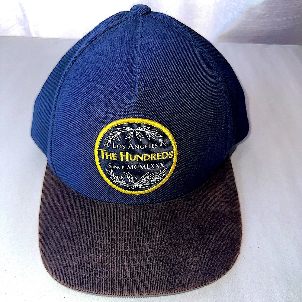 Used the hundreds round embroidered patch at with corduroy brim